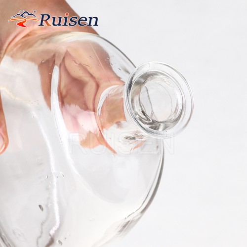 Hot-selling custom logo transparent glass bottle brandy glass bottle with stopper 750ml