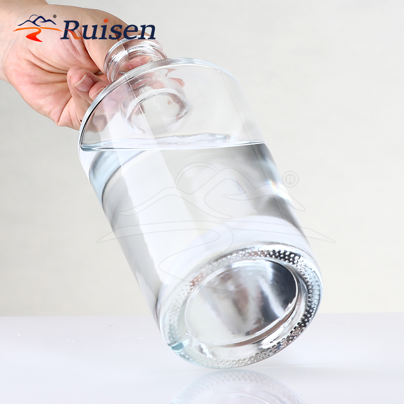 Factory Custom 700ml Round Shape Vodka Glass Bottles Premium 500ml 750ml Whisky Gin Spirit Glass Bottle for Liquor Beverage 